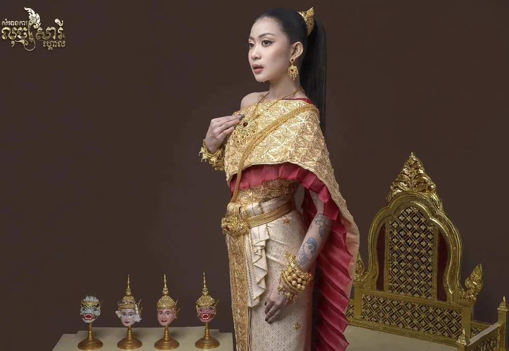 DJ VOCKA in full Khmer classical dress with a gilded throne and classical dance masks